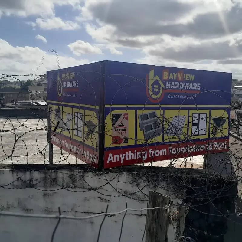 Large-format commercial advertising signage designed for prominent exterior display and improved visibility from surrounding roads.