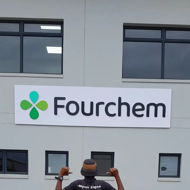 Completed exterior signage project showcasing the installed Fourchem business sign and its prominent position on the building façade.