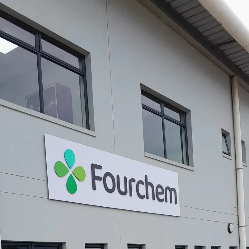 Professional exterior building branding featuring large-format corporate signage that improves business identification and visibility.