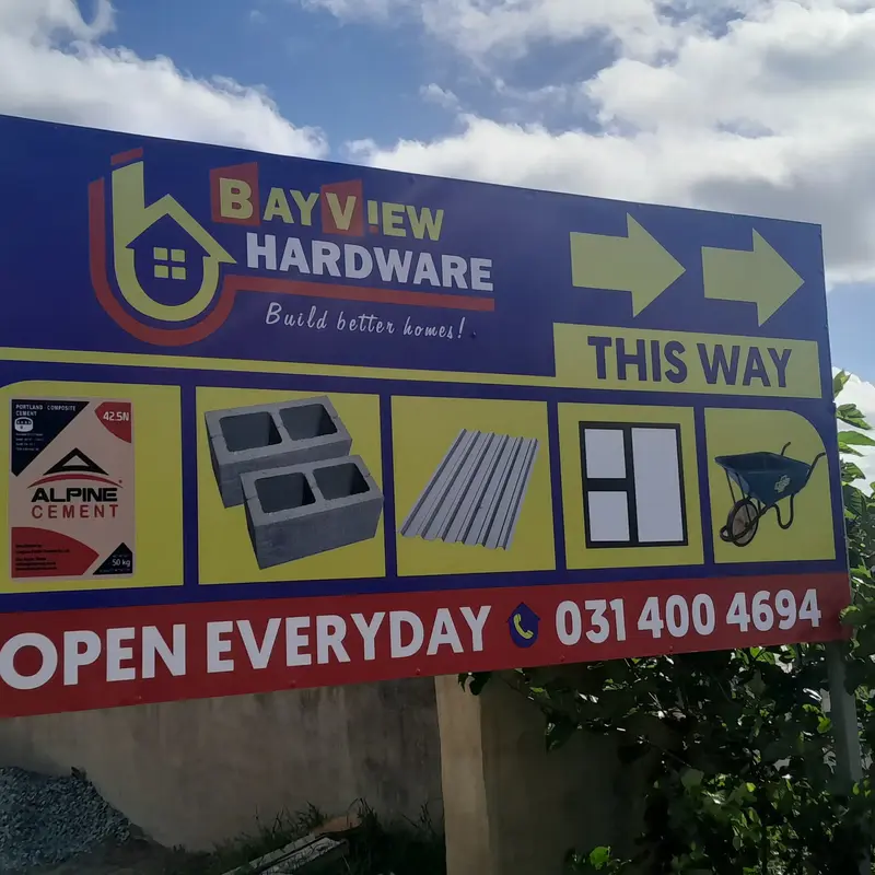 Professional outdoor advertising signage combining business promotion, clear directions and high-visibility colours.